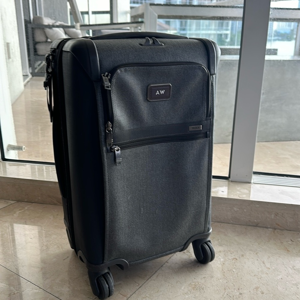 TUMI International Expandable 4 Wheeled Carry-On